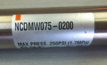 Load image into Gallery viewer, SMC NCDMW075-0200 double rod round body pneumatic cylinder
